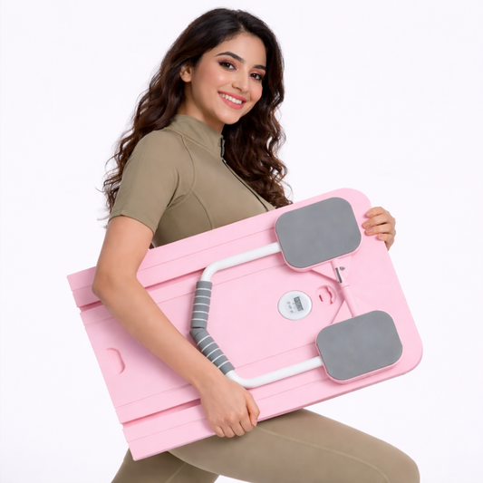 Pink Pilates Board flatlay with accessories